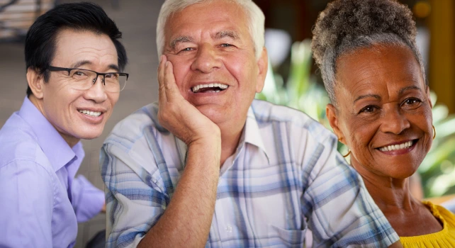 Homem japonês, homem velho branco e mulher negra sorrindo com dentes naturais.